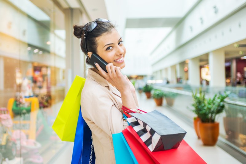 Lady on a phone in a shopping mall | Martec International